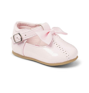 pink hard sole bow shoes 